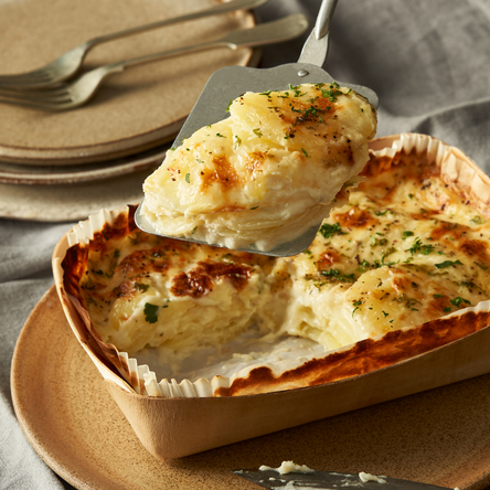 Emballages traiteur présentant un gratin doré par son passage four